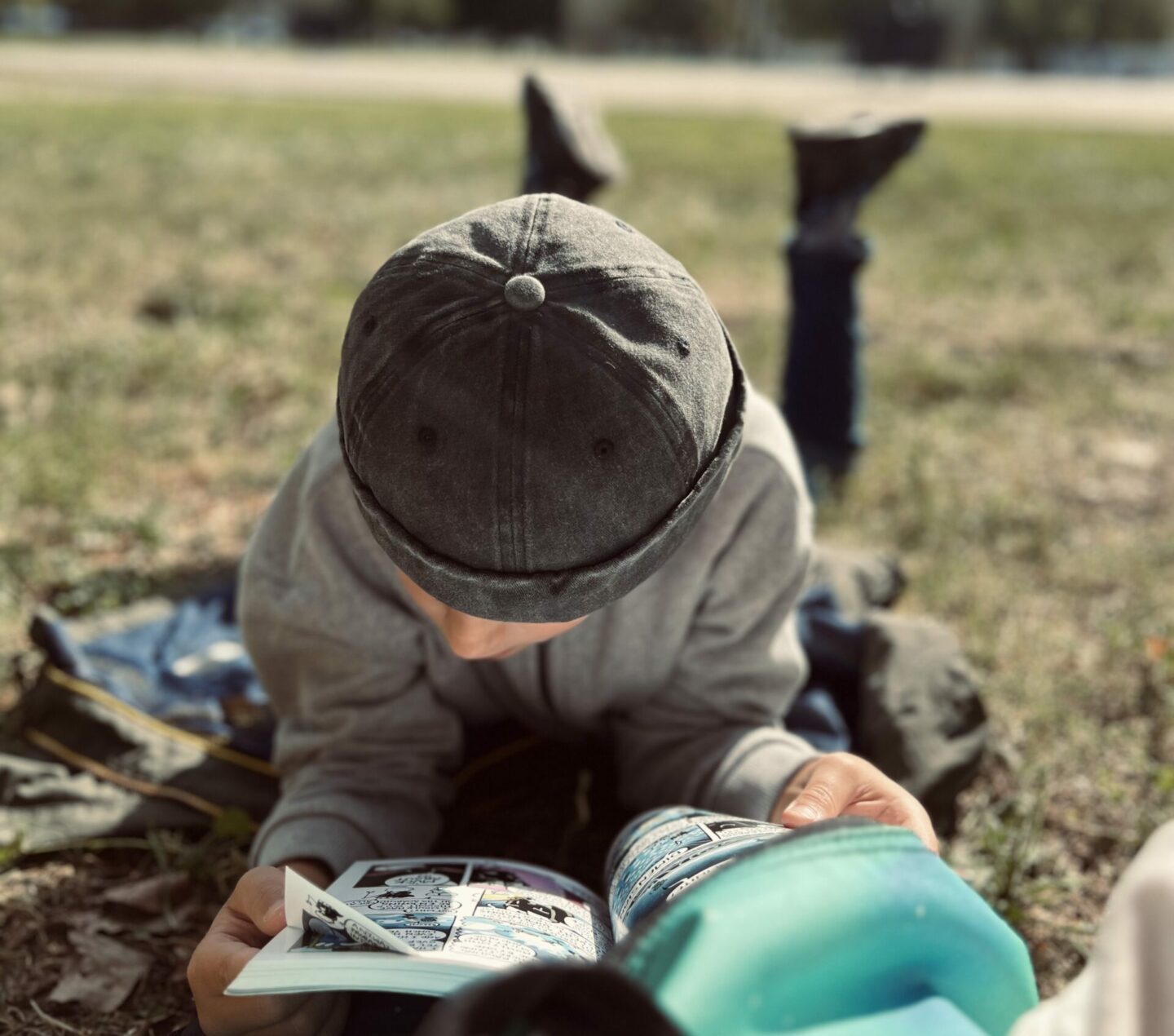 Boy reading a book. Does education help entrepreneurs?
